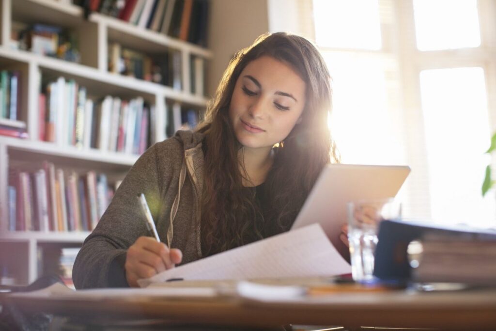 Black long hair girl in casual study environment.
