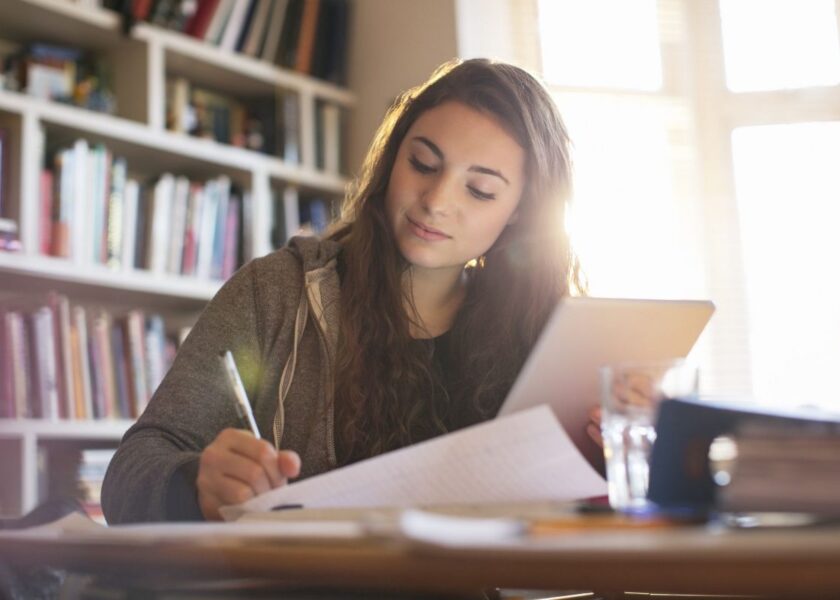 Black long hair girl in casual study environment.