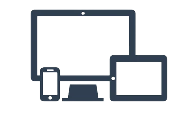 a computer and tablet with a phone and monitor